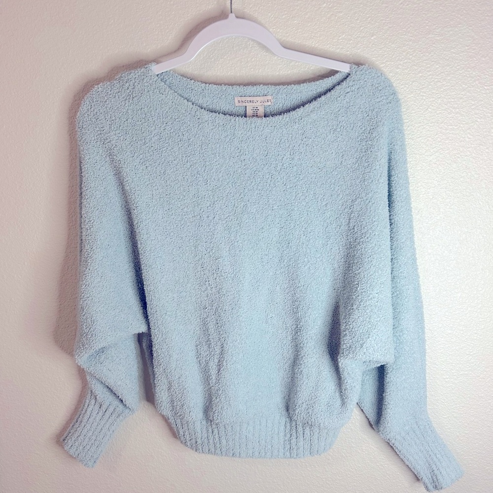 8- light blue sweater